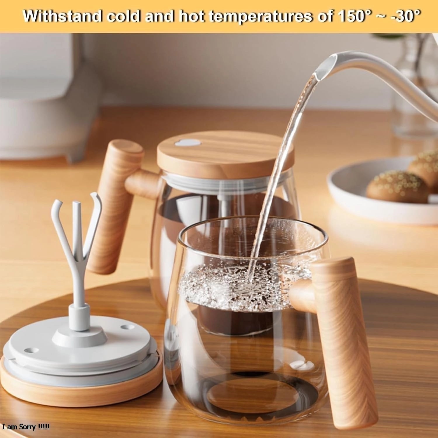 Glass teapot with wooden handle and lid on a wooden surface, with text about temperature resistance.